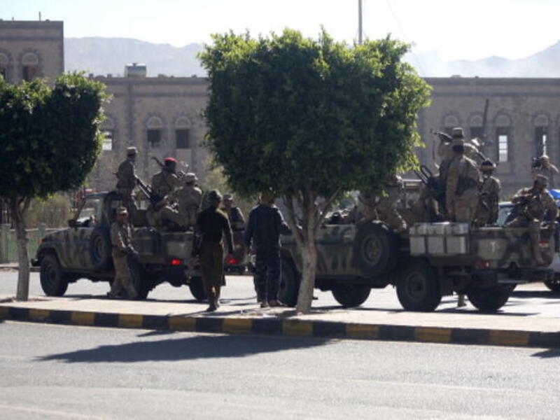 Yemeni soldiers patrol a street after a suicide car bombing at the defence ministry in the Yemeni capital Sanaa on December 5, 2013. [AFP]