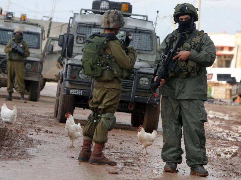 Israeli soldiers shot and killed a Palestinian man after he struck three soldiers while driving a truck. (AFP/File)