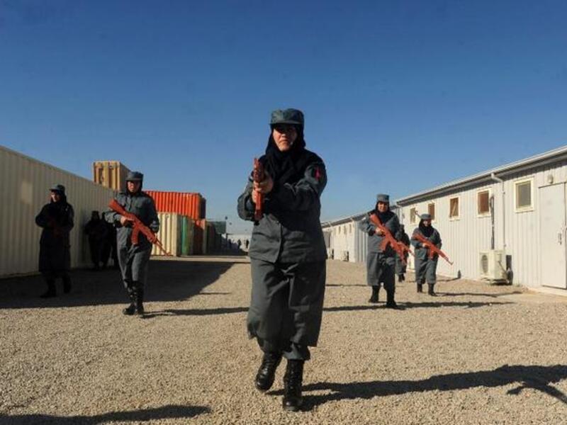 Afghanistan National Police during a training exercise at a police academy outside Herat on Christmas Day. (AFP PHOTO/ AREF KARIMI)