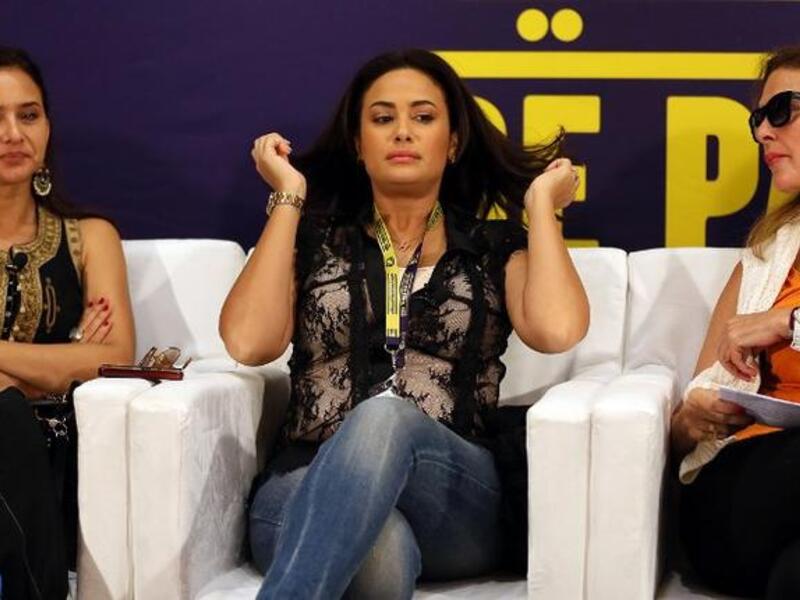 Egyptian actresses Yusra (R), and Nelly Karim (L) sit along side Tunisian actress Hind Sabry (C) during the Doha Tribeca Film Festival in the Qatari capital.