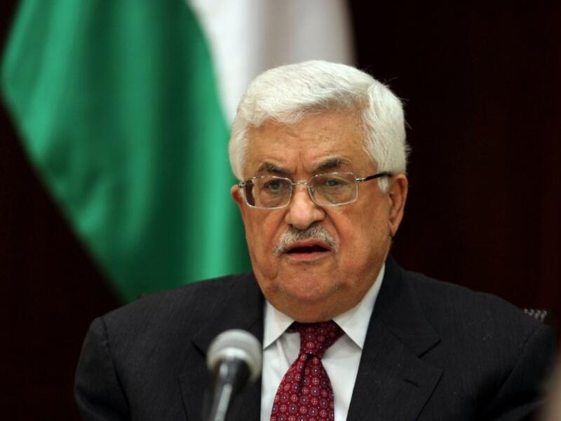 Palestinian president Mahmoud Abbas addresses a meeting in the West Bank city of Ramallah. (AFP PHOTO/ABBAS MOMANI)