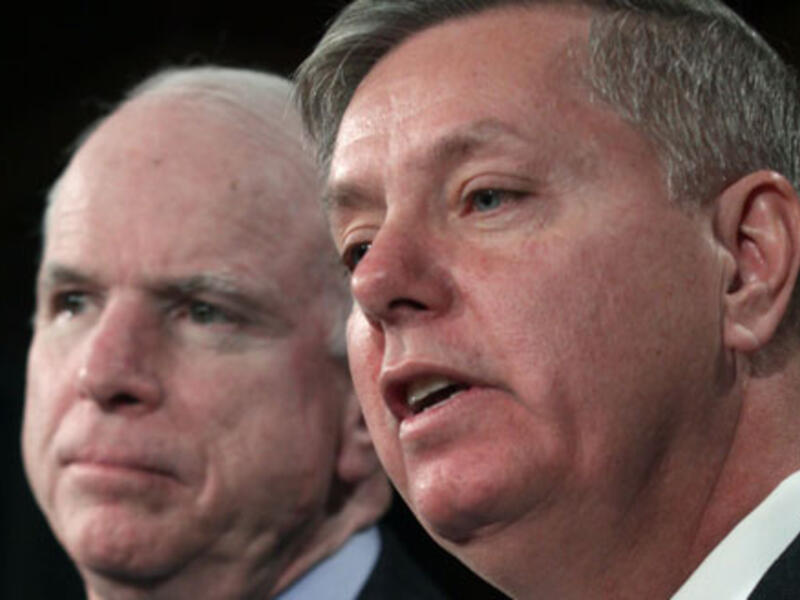 US Lawmakers John McCain and Lindsey Graham expressed doubts regarding the success of the proposed Geneva peace talks in ending the conflict in Syria (AP)