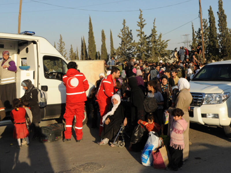 Syrian civilians were evacuated from a besieged town near Damascus earlier this year in a rare truce agreement that suspended rebel-regime fighting to allow Syrians to flee to safety (File Archive/AFP)