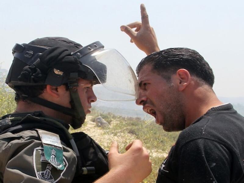 Tensions ran rife in the West Bank earlier this week as Palestinian land was burned and destroyed by Israeli settlers in retaliation to the stabbing of an Israeli man on Tuesday. AFP photo