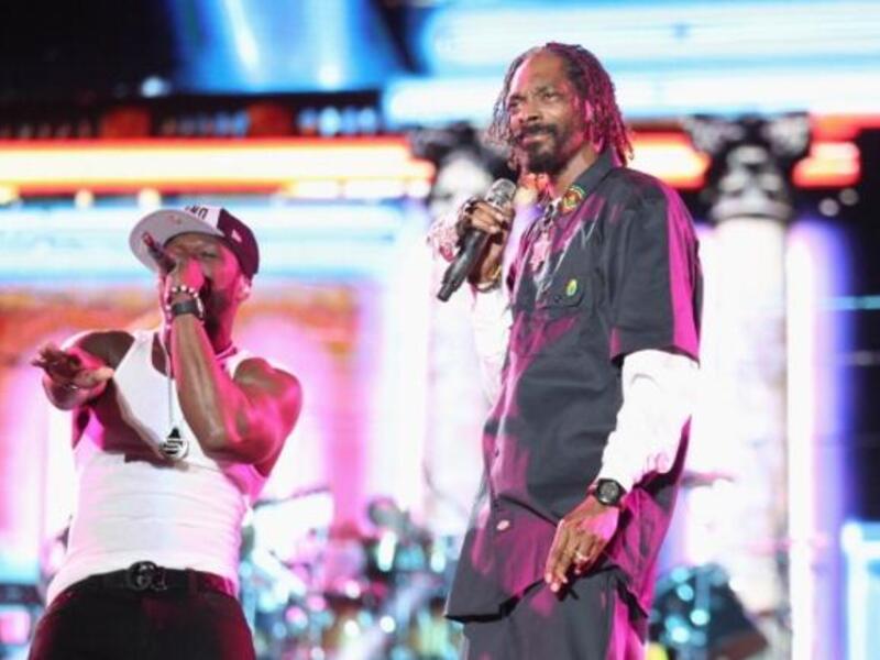 50 Cent performs with Snoop Lion (formerly Snoop Dogg) earlier this year