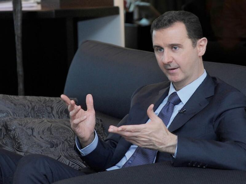 Syria's Information Minister said this week that the "Syrian street" wants Assad to run for president in this year's upcoming elections (File Archive/AFP)