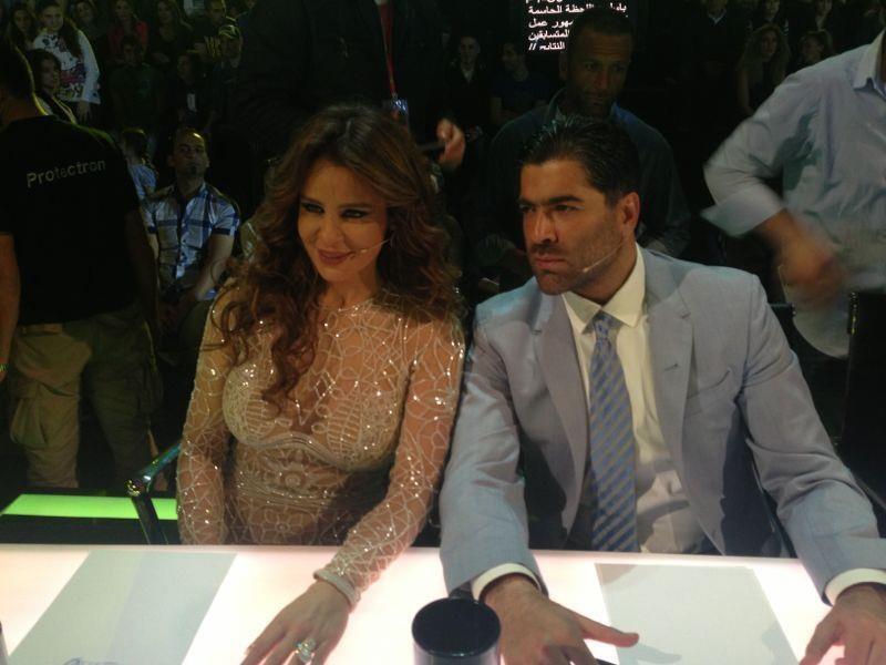 Carole and Wael get down to business.