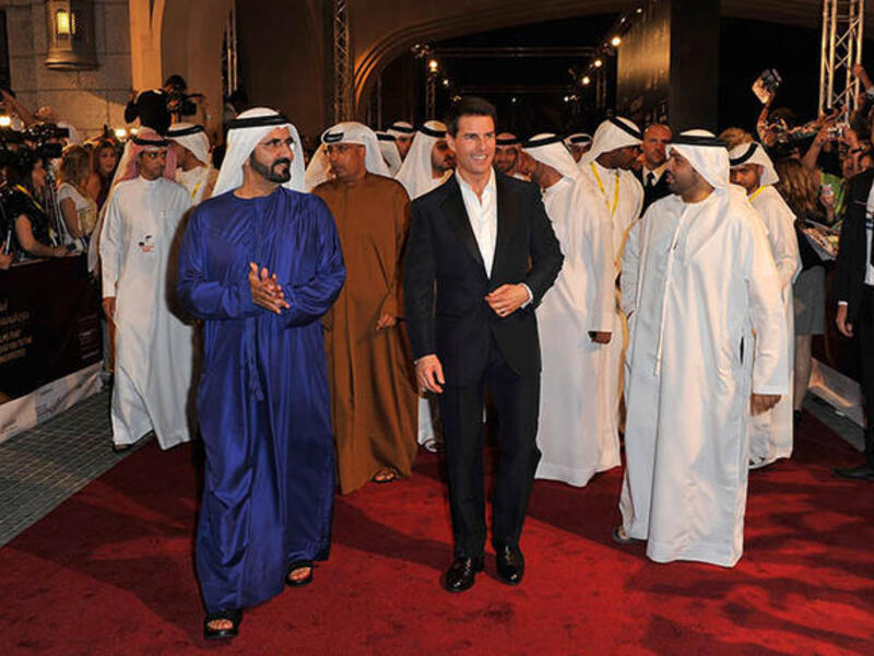 Sheikh Mohammed Bin Rashid Al Maktoum with Tom Cruise at the Dubai International Film Festival in 2011