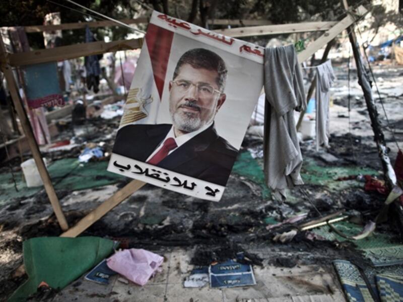 Morsi is planning on suing the Egyptian government over his ousting in July, his lawyers said Wednesday. (AFP/File)