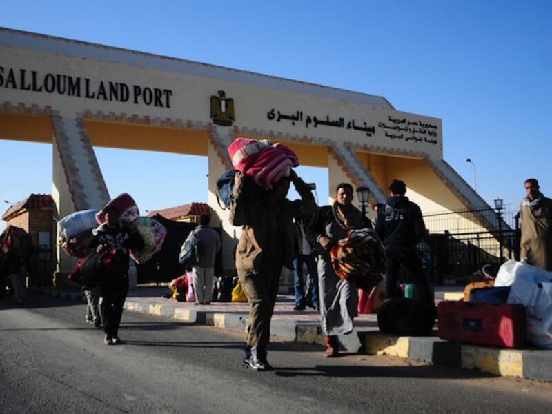 Thousands of Egyptians cross the border every day for work in Libya (File Archive/AFP)