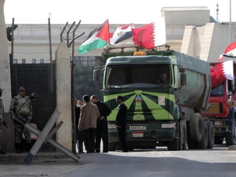 An Egyptian truck loaded with gravel prepares to enter through the Rafah border crossing, between Egypt and Gaza Strip, on Saturday. (AFP PHOTO / SAID KHATIB)