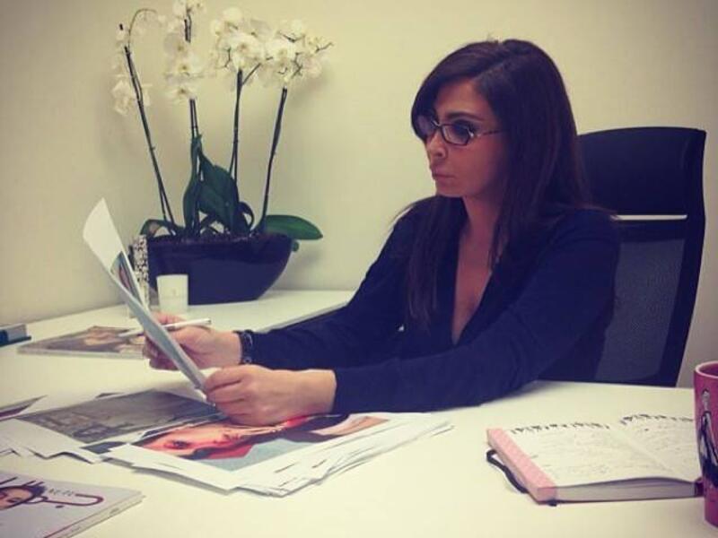 Here Elissa sits in her new Editor-in-Chief seat. (Image: Facebook)