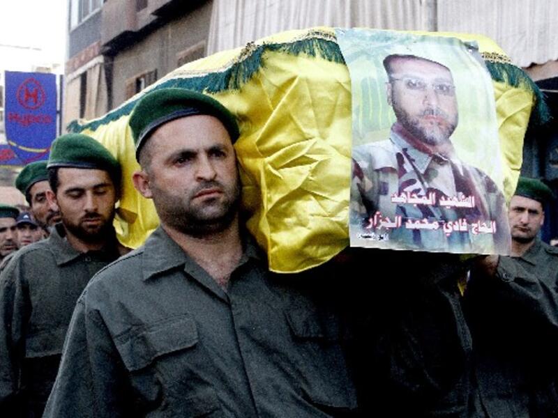 Members of Lebanon's Hezbollah carry the coffin of Fadi Mohammed al-Jazzar during his funeral in southern Beirut on Monday. AFP Photo