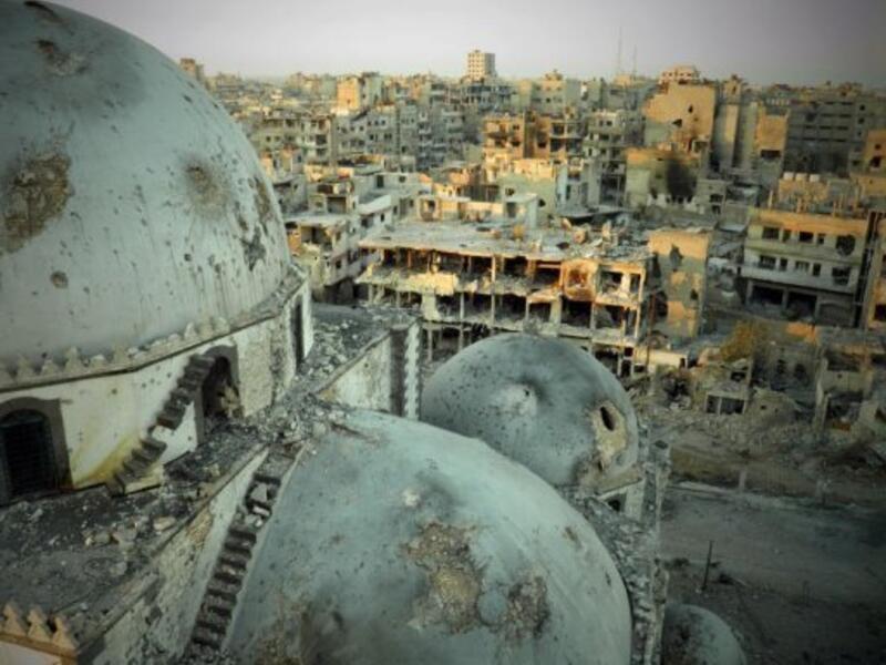 Destroyed buildings are shown in the al-Khalidiyah neighbourhood of the central Syrian city of Homs, July 25, 2013 (Shaam News Network/AFP/File)