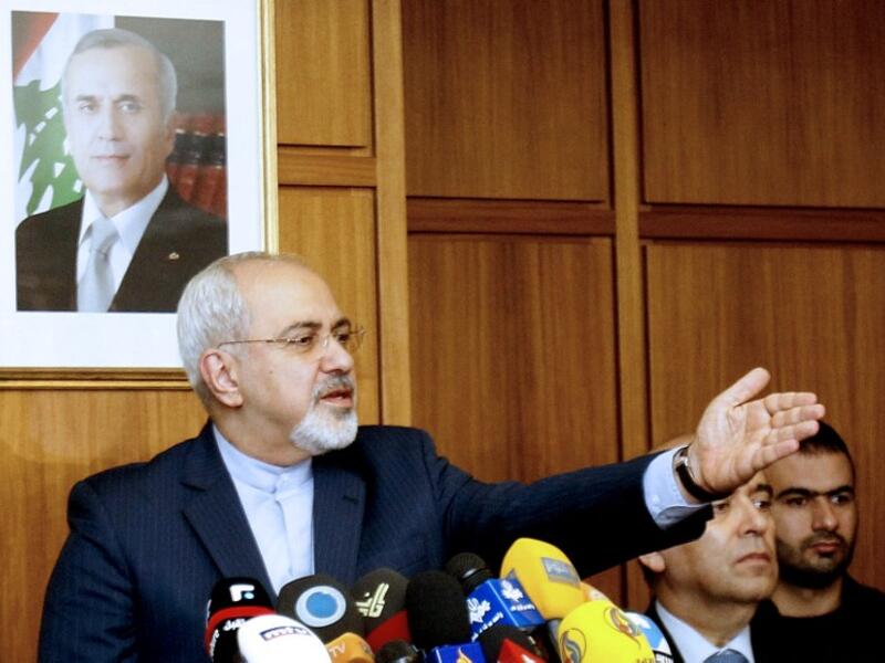 Iranian Minister of Foreign Affairs Mohammad Javad Zarif speaks to journalists at Rafic Hariri International airport in Beirut on January 12, 2014 upon his arrival for a one day visit to Lebanon to meet Lebanese officials. Iran and Lebanon are looking to boost their bilateral ties. (AFP)
