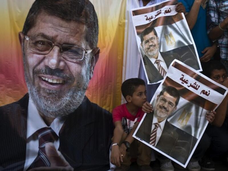 Morsi is charged with collaborating with Hamas and Hezbollah when escaping from prison during the 2011 revolution. (AFP/File)