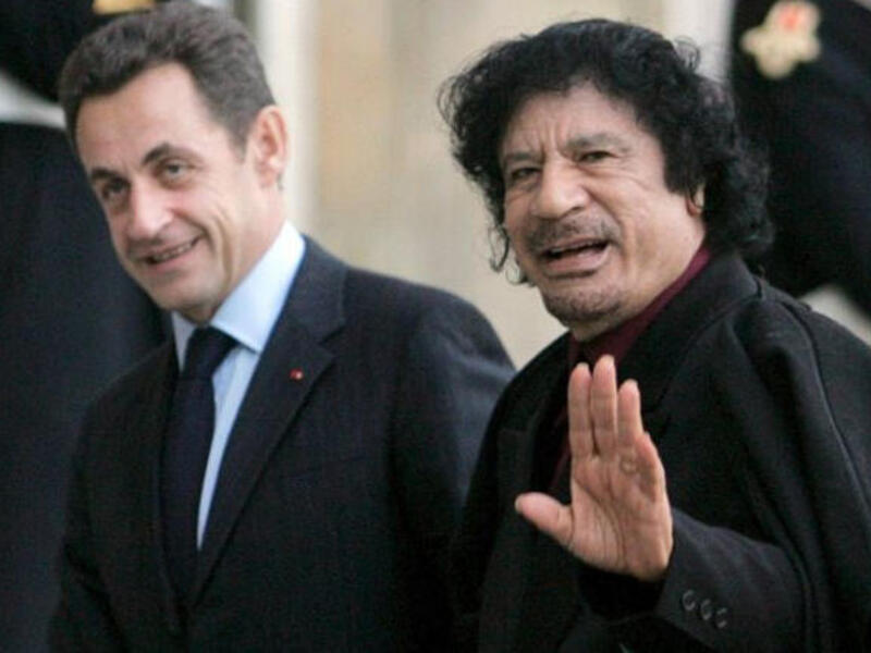 France’s former President Nicolas Sarkozy with he late Libyan leader, Muammar Qaddafi.