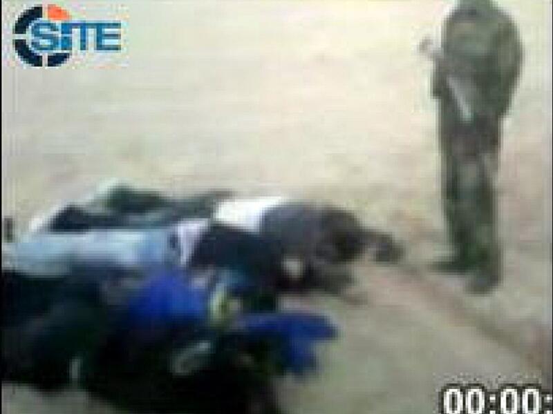 This image released by the SITE Intelligence Group, reportedly shows the executions of seven foreign employees of the Setraco construction company kidnapped by the Nigerian Islamist group Ansaru. (AFP PHOTO / SITE Intelligence Group) 