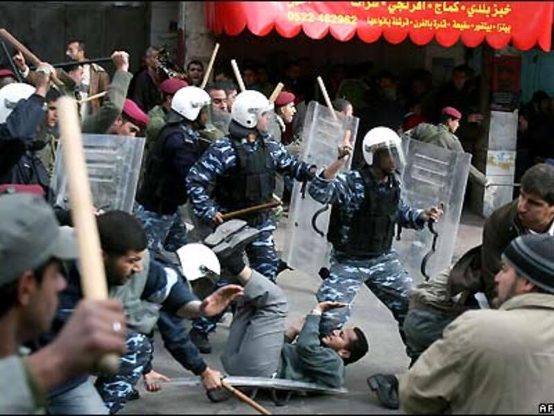 Palestinian police fight protesters in Ramallah. (AFP/File)