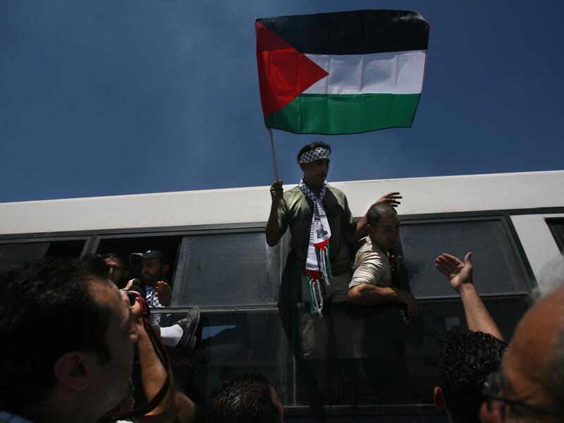 Israel regularly detains Palestinians for arbitrary reasons, such as entering Jerusalem after having their IDs revoked. (AFP/File)