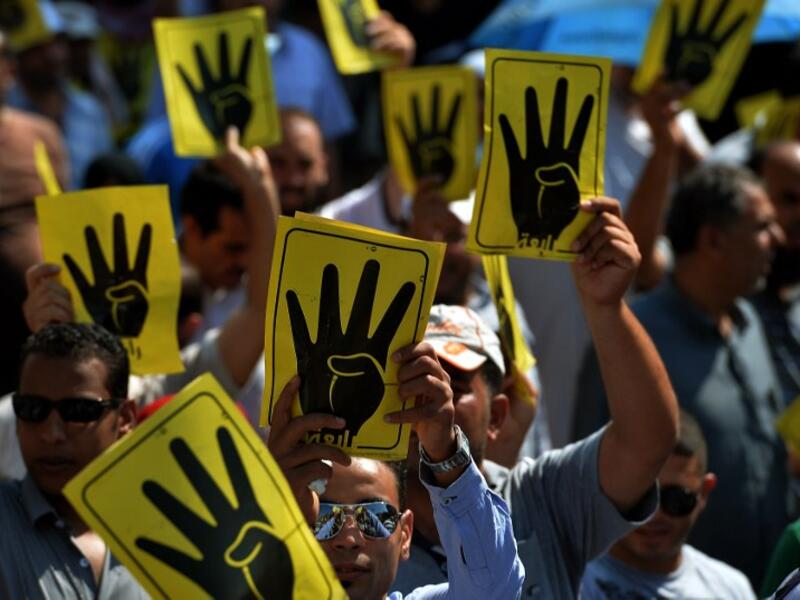The Egyptian police launched an offensive on the Cairo district of Kerdasah on Thursday in an attempt to arrest Islamist militants suspected of torching police stations and killing security officials. (AFP/File)