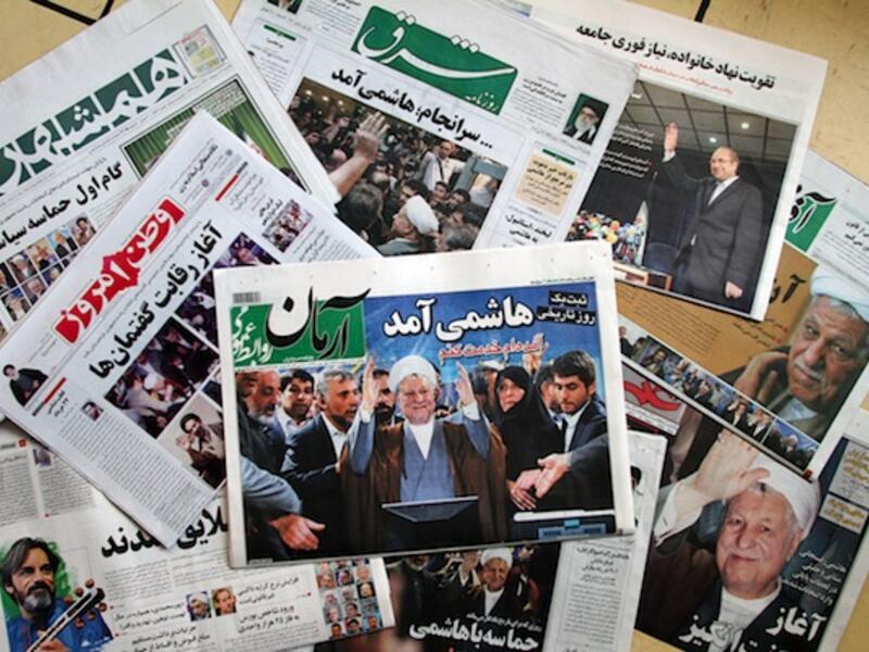 Iranian newspapers show their support of Rafsanjani, before his disqualification by the GC. AFP Photo