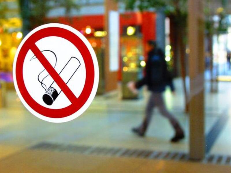 is the smoking ban detrimental to Abu Dhabi's businesses?