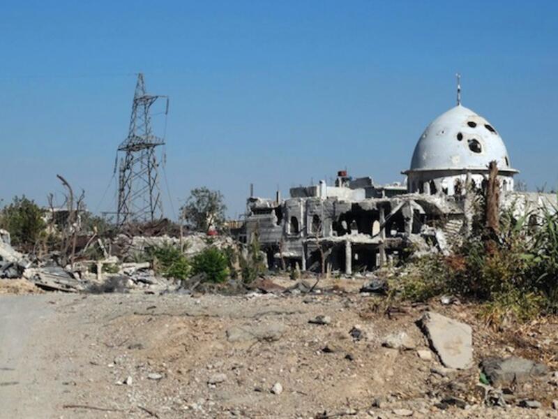 A handout picture from the Syrian opposition shows a mosque damaged in shelling by Syrian government forces in the Damascus suburb of Jobar in early August. (AFP/Shams News Network)