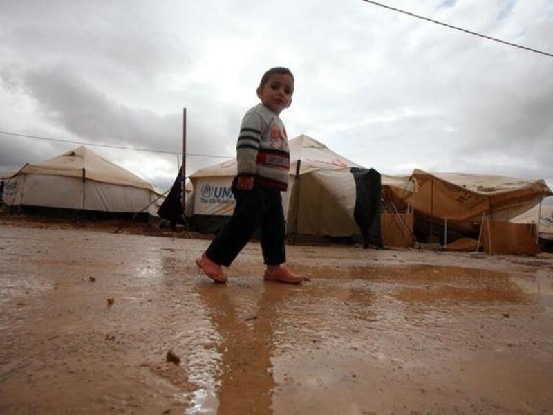 Child walks through the Zaatari refugee camp in Jordan (UNICEF photo)