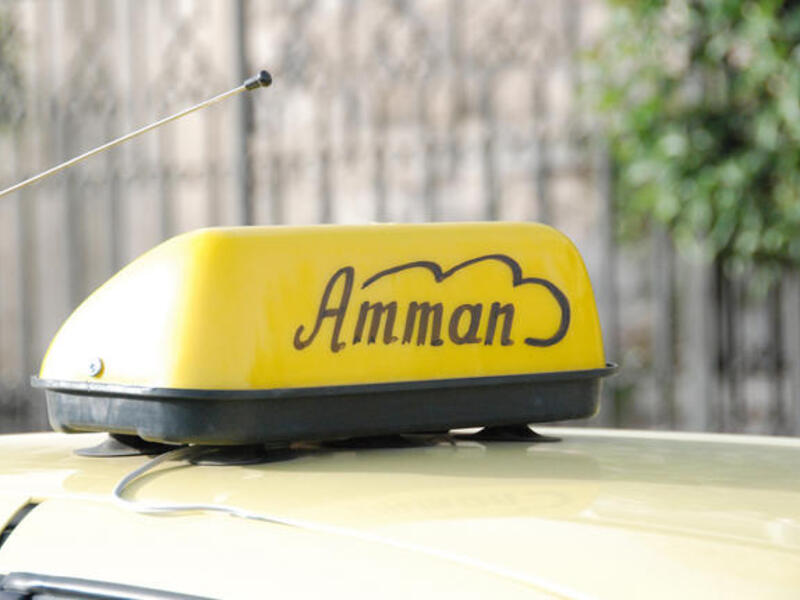 A yellow Taxi cab in Amman.
