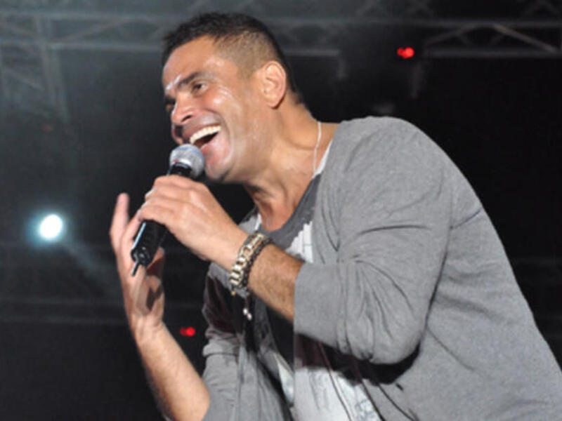 Amr Diab was filmed secretly holding a concert in Greece. (Image: Facebook)