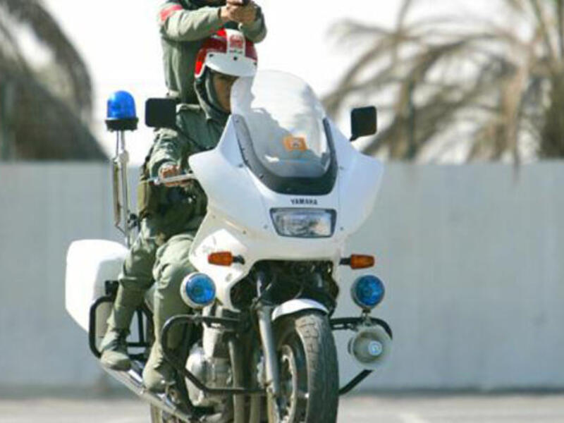 Dubai Police swap guns for microphones as they get set to record an anti-narcotics song (Photo: xkmph.com)