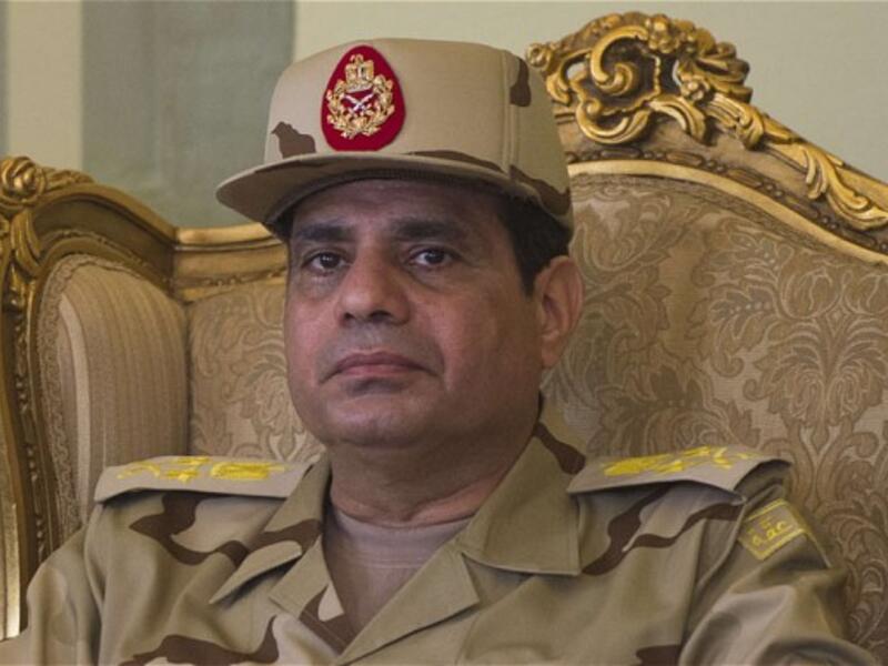A file picture taken on September 20, 2013 shows Egypt's army chief Abdel Fattah al-Sisi, who is allegedly contemplating a bid for the presidency. [AFP]