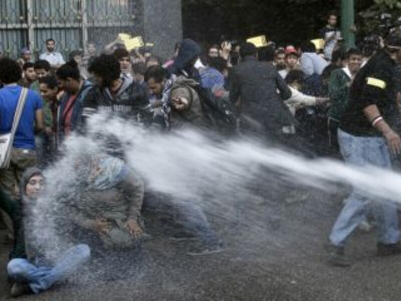 Egyptian security officials used water cannons and teargas to disperse two protests in Cairo Tuesday (Khaled Desouki/AFP)