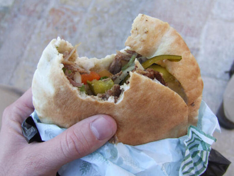 Man eating junk food (image used for illustrative purposes)