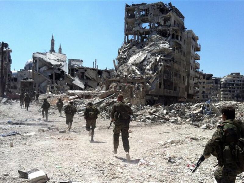 Regime forces have kept the city of Homs under siege for nearly 600 days (AFP)