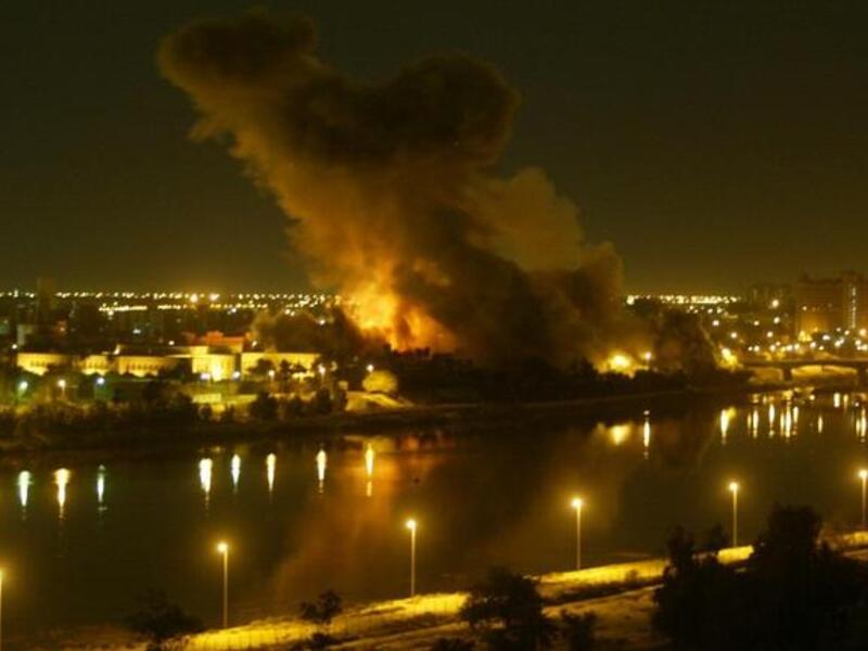 File picture dated March 20, 2003 shows smoke billowing after a missile hit the planning ministry in Baghdad as the Iraqi capital came under heavy US-led bombardment on the first day of the US-led invasion of Iraq that toppled Saddam Hussein. (AFP / Ramzi Haidar)