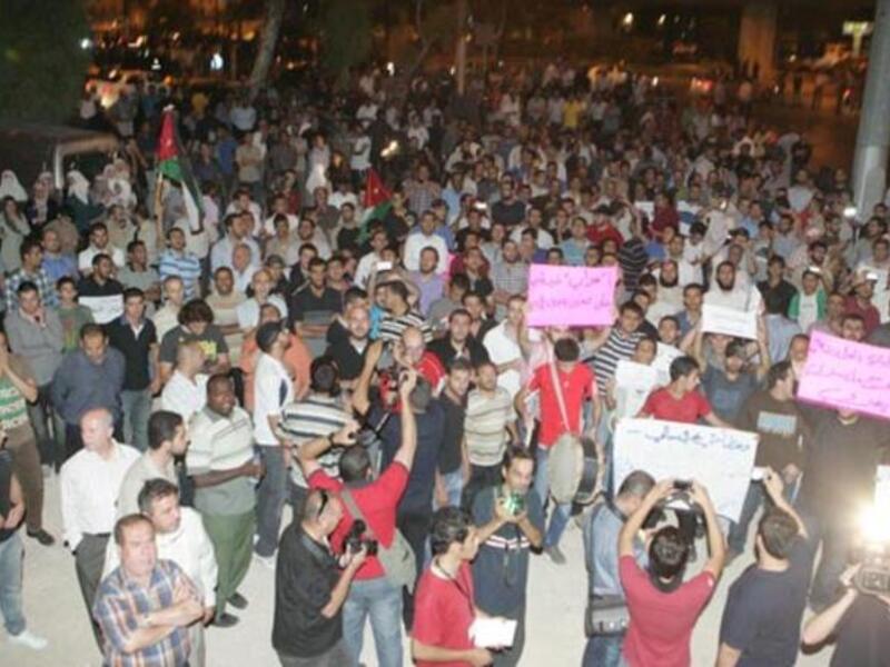 Activists demostrate near the Interior Ministry Circle, central Amman, to protest government decision to hike fuel prices on Saturday (Photo by Khaled Oudat)
