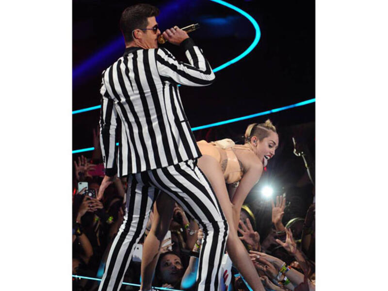 Miley Cyrus shocked celebs and viewers alike with her trashy fashion choices and un-ladylike behavior. (Image: Facebook)