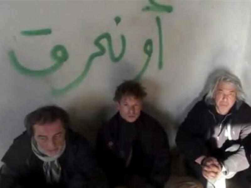 At least 52 journalists have been killed covering the Syrian conflict. Here, footage from an amateur video shows NBC chief foreign correspondent Richard Engel and several colleagues after they were abducted by an armed gang in Syria. (Image via thejournal.ie)