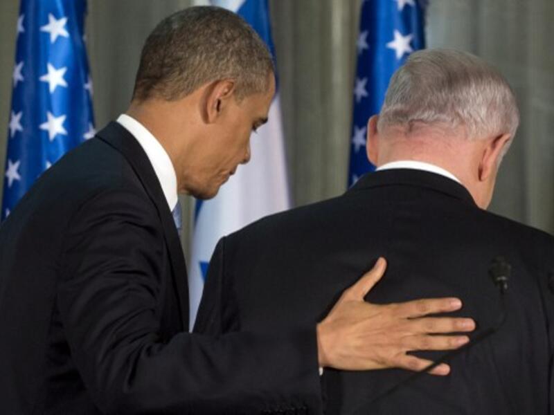 Israeli Prime Minister Benjamin Netanyahu (R) and US President Barack Obama leave after holding a joint press conference at the Prime Minister's Residence in Jerusalem, on the first day of Obama's three day trip to Israel and the Palestinian Territories. (AFP  / Saul Loeb)