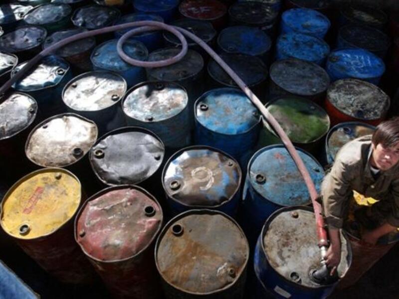 Dents in the Arab economy, like these rusty oil cans