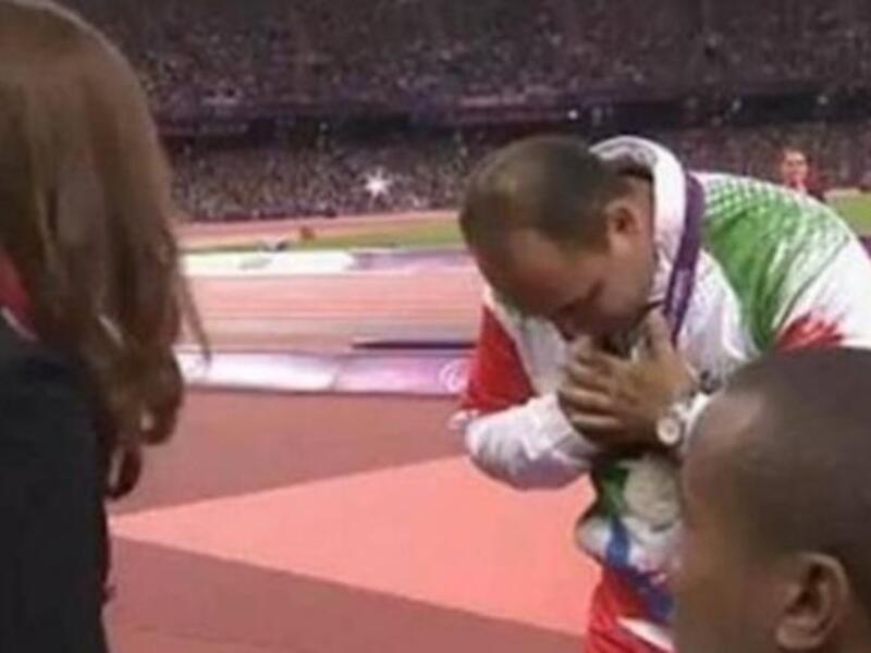 Mehrdad Karam Zadeh bowed his head rather than have contact with an unrelated woman (source: Press TV)