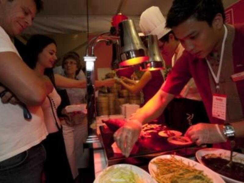 Visitiors wait to taste Peking duck at The China Club (Oliver Clarke) (Gulf News)