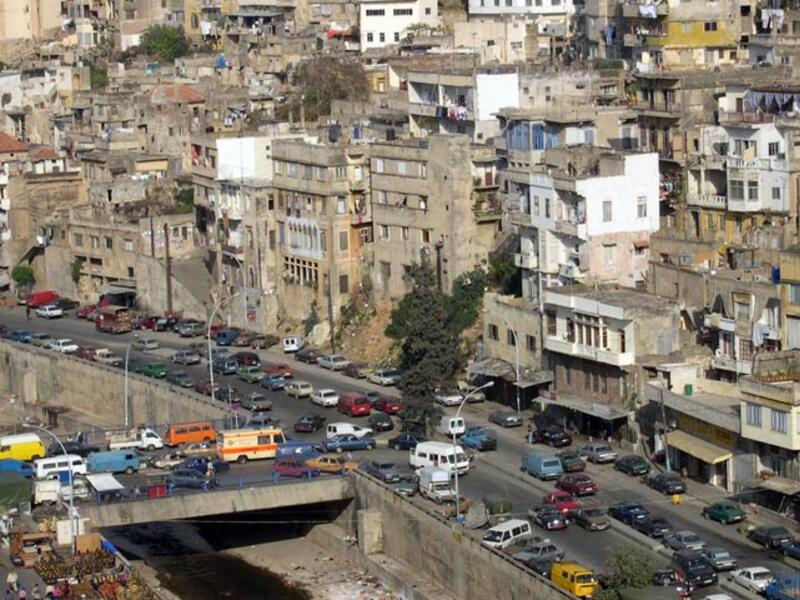 Rival neighborhoods Bab al Tabbaneh and Jabal Mohsen have fought since the Lebanese civil war. (AFP/File)