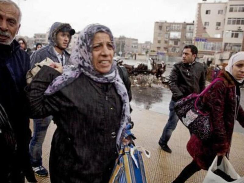 Due to Syrian President Bashar Assad's tactics of starving out the Damascus suburbs under rebel control, there is a growing humanitarian crisis in the Yarmouk refugee camp. (AFP/File)