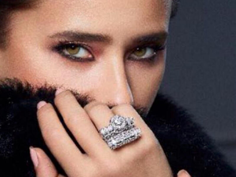 And the camera loves her catlike colored eyes