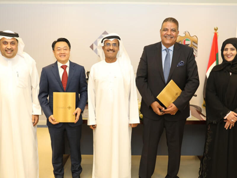 Dr Al Nuaimi with officials of the companies at the signing ceremony.
