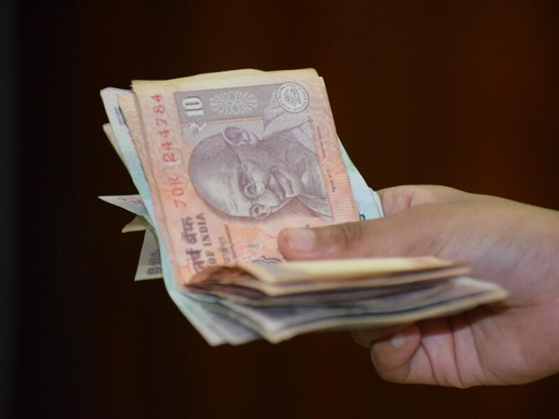 The rupee could trade in the range of 70-71 against the dollar this week. (Shutterstock)