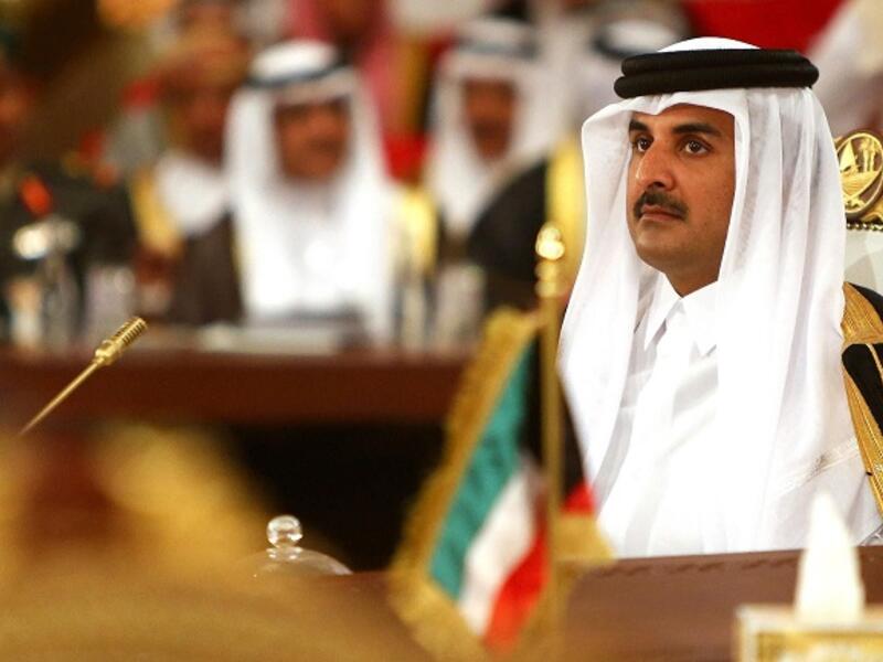 Qatar's Emir Sheikh Tamim bin Hamad Al-Thani looks on during the Gulf summit in Doha on December 9, 2014. (Marwan Naamani/ AFP)